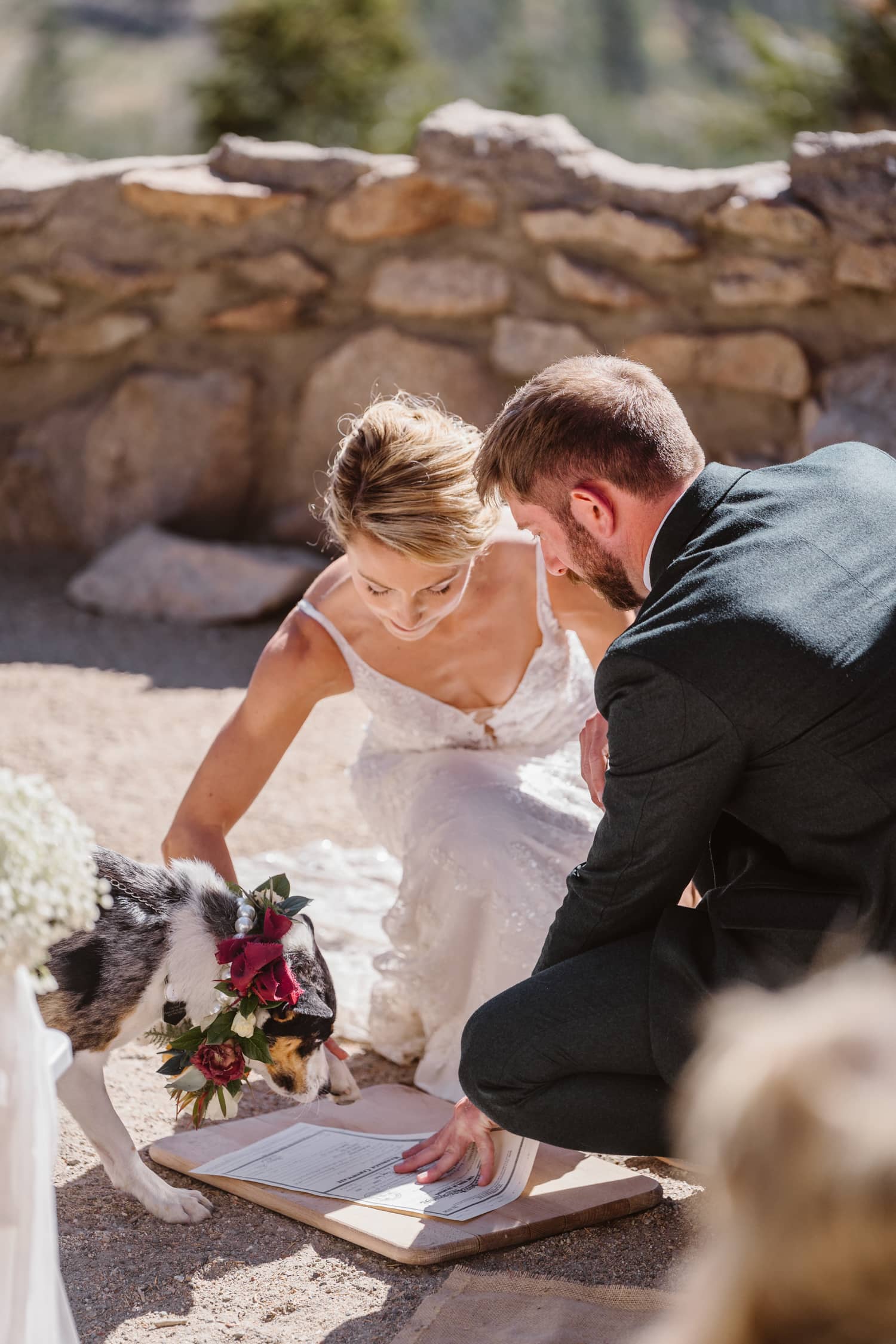 Couple signing their marriage license for their Breckenridge, Colorado elopement.