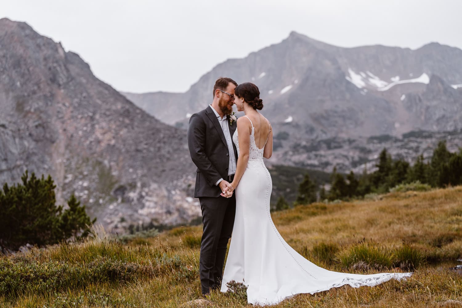 Couple sharing a first dance in the mountains at their elopement in Colorado.
